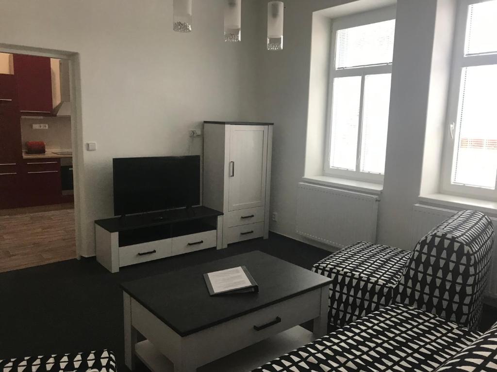 TV a/nebo společenská místnost v ubytování Penzion Na Vápence