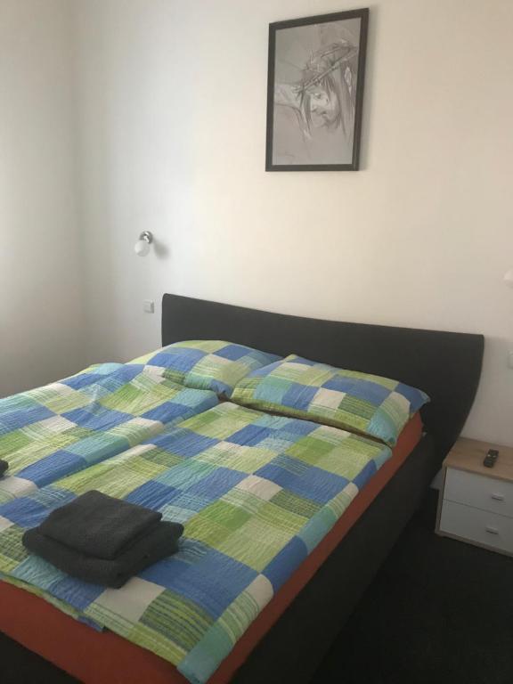 Postel nebo postele na pokoji v ubytování Penzion Na Vápence
