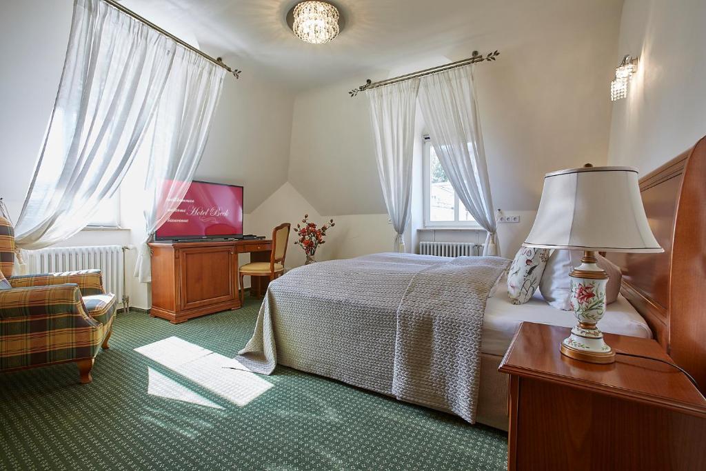 Postel nebo postele na pokoji v ubytování Hotel Beek by Anna