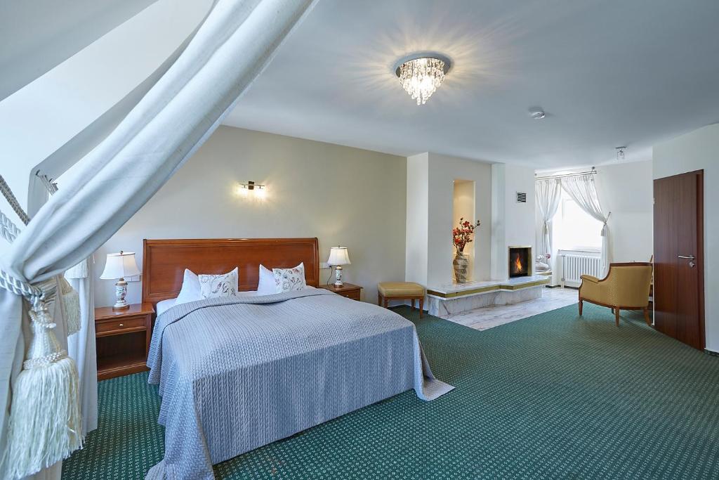Postel nebo postele na pokoji v ubytování Hotel Beek by Anna