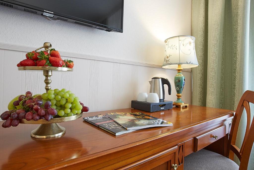 TV a/nebo společenská místnost v ubytování Hotel Beek by Anna