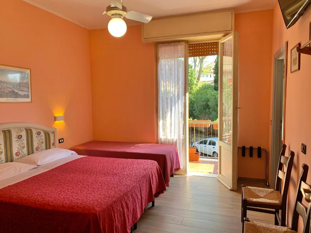 Katil atau katil-katil dalam bilik di Albergo Cinzia