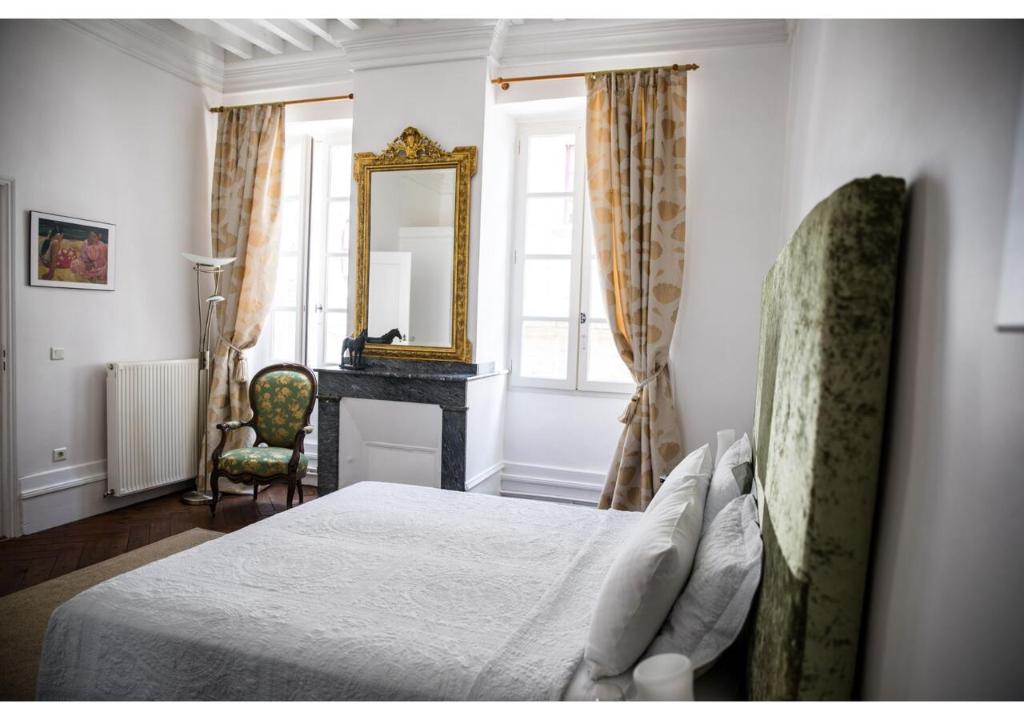 Postel nebo postele na pokoji v ubytování La Résidence Chambre d'Hotes
