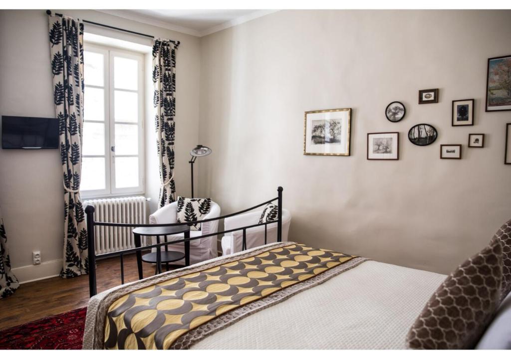 Postel nebo postele na pokoji v ubytování La Résidence Chambre d'Hotes