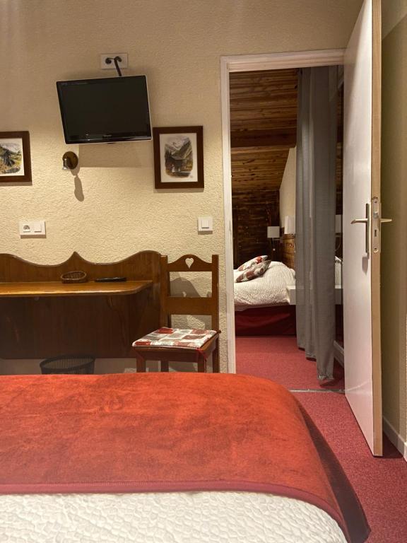 Postel nebo postele na pokoji v ubytování Auberge de la Dranse