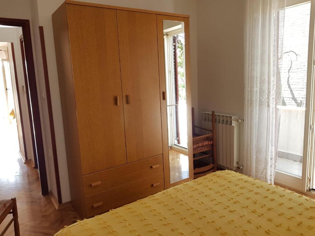 Posteľ alebo postele v izbe v ubytovaní Apartments Ivana Diklo