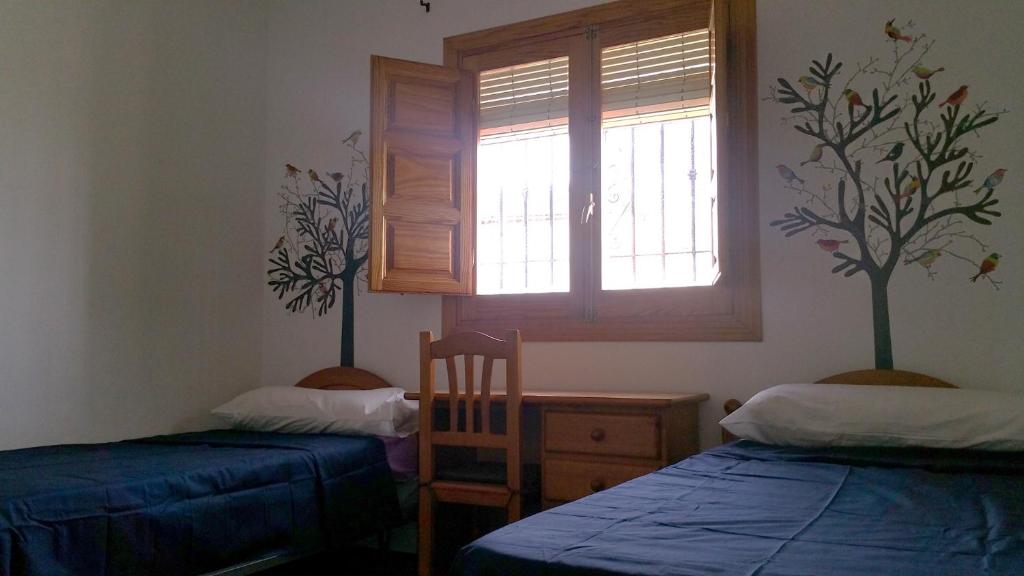 Posteľ alebo postele v izbe v ubytovaní Villa Virginia - Costa tropical