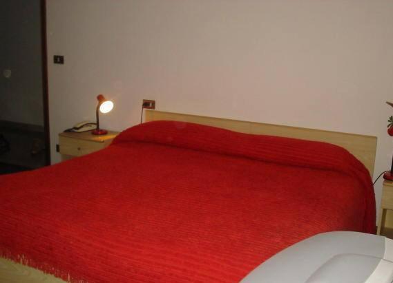 Postel nebo postele na pokoji v ubytování Hotel Cime d'Auta