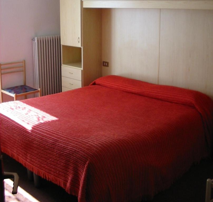 Postel nebo postele na pokoji v ubytování Hotel Cime d'Auta