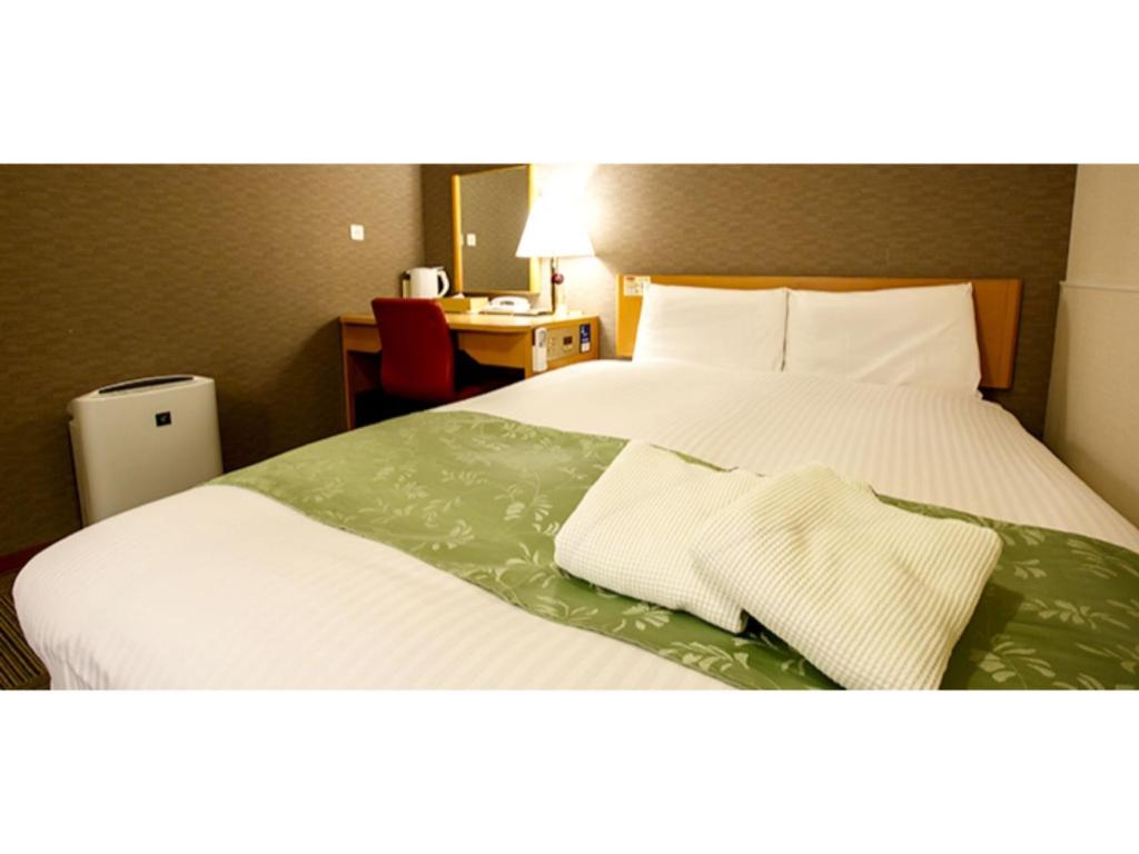 Lova arba lovos apgyvendinimo įstaigoje Hakata Floral Inn Nakasu / Vacation STAY 80218