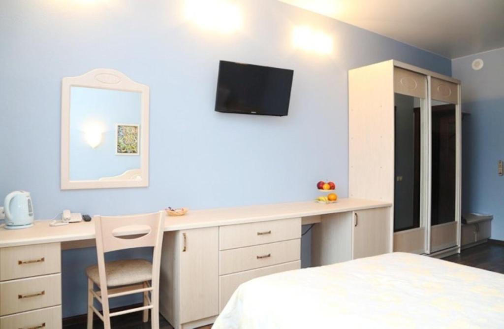Postel nebo postele na pokoji v ubytování Hotel Chalpan