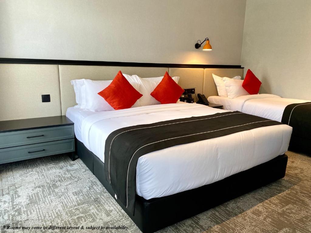 Postel nebo postele na pokoji v ubytování Stanton Hotel