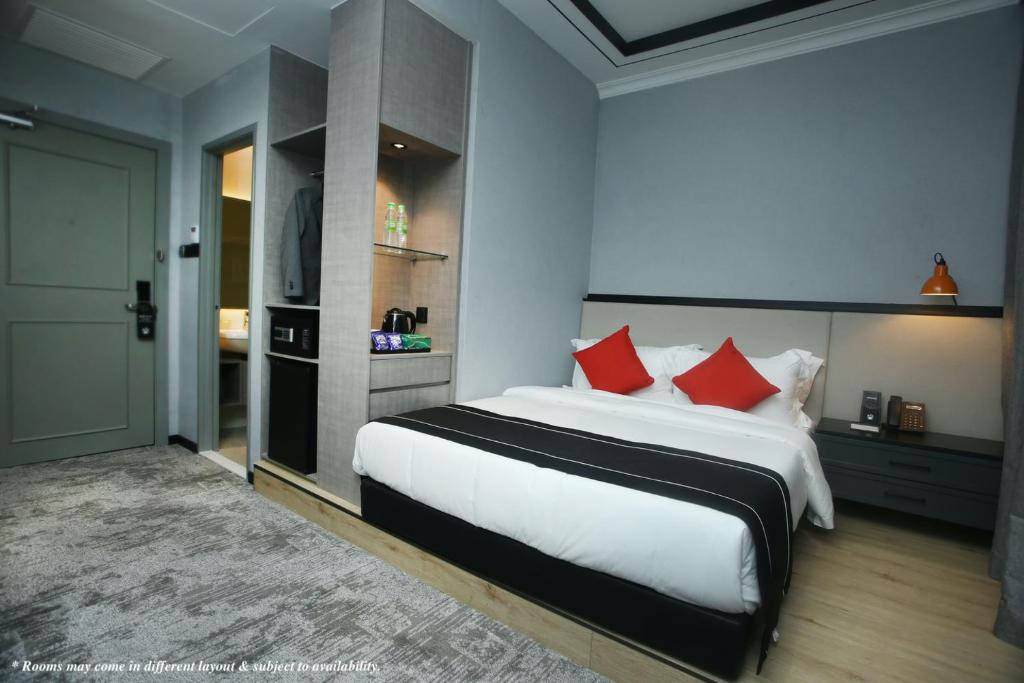 Postel nebo postele na pokoji v ubytování Stanton Hotel