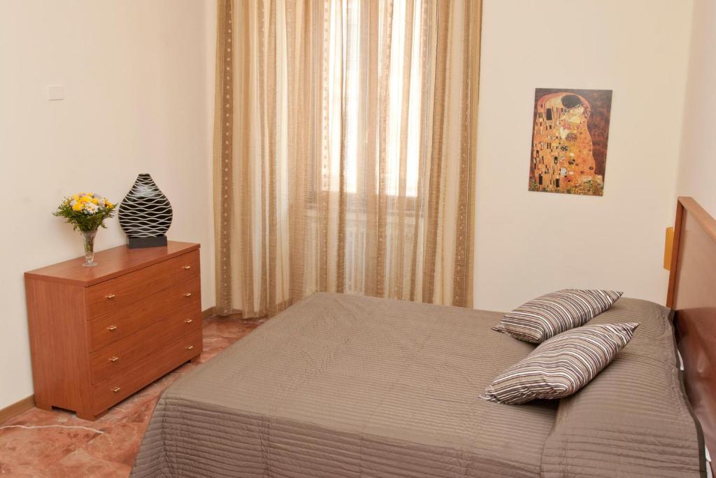 Cama o camas de una habitación en Le Cupoline