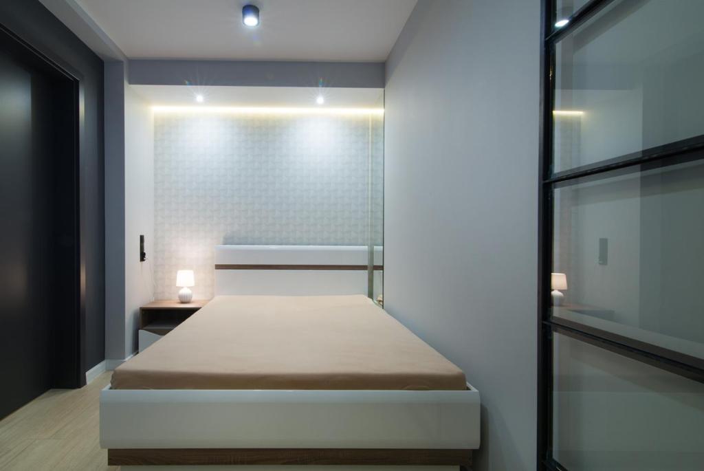 Posteľ alebo postele v izbe v ubytovaní Apartament Przytulny
