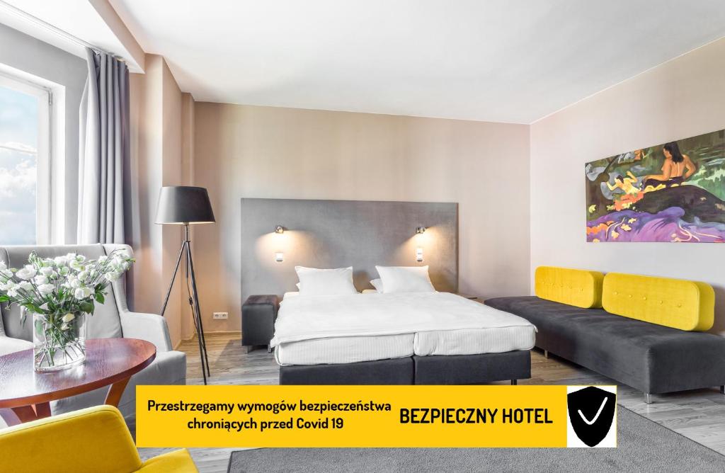 
Ein Bett oder Betten in einem Zimmer der Unterkunft Hotel Kaliski
