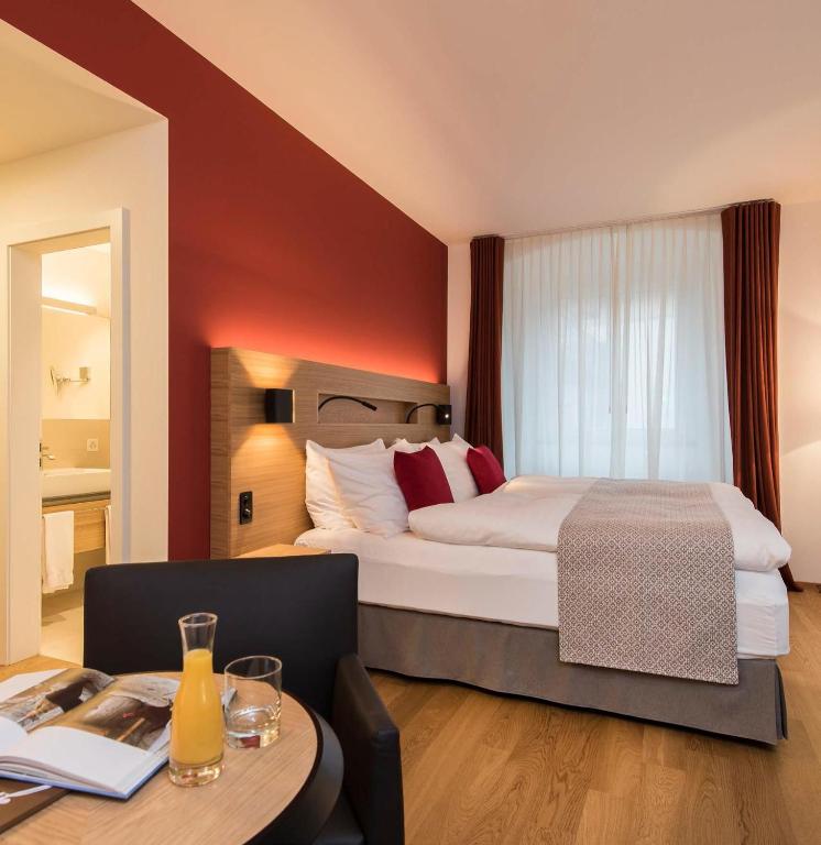Postel nebo postele na pokoji v ubytování Hotel Fravi