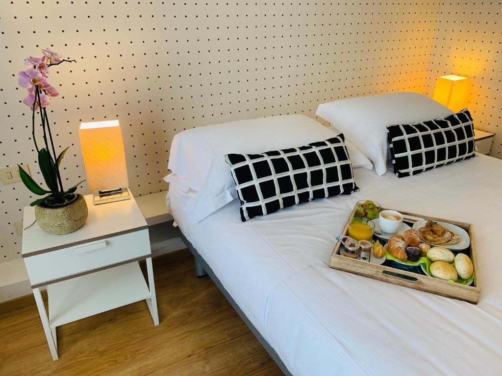 Posteľ alebo postele v izbe v ubytovaní Hotel Blaise & Francis