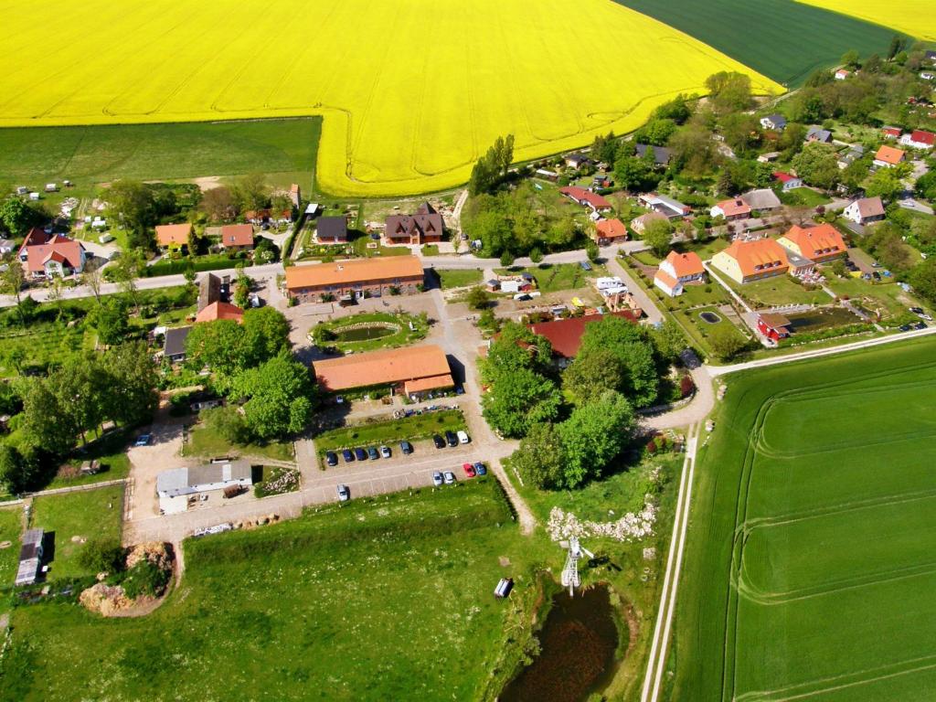 an aerial view of a small town with a farm at Rügenhof Kap Arkona in Putgarten