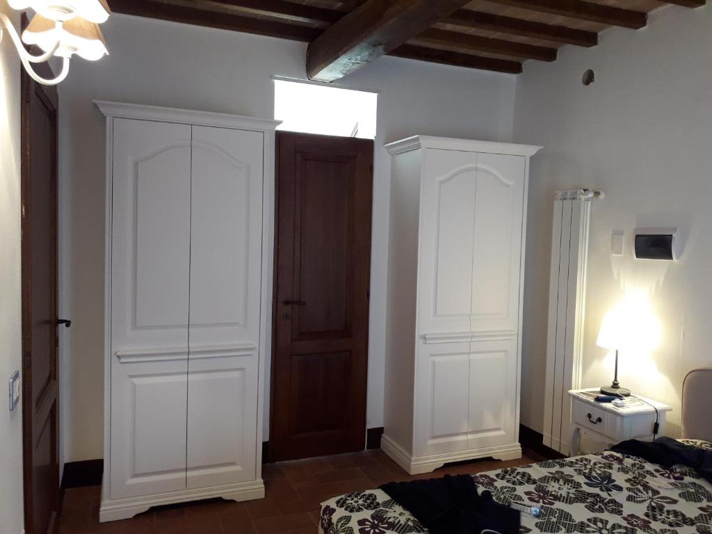 Posteľ alebo postele v izbe v ubytovaní Casa Lisa al Borgo