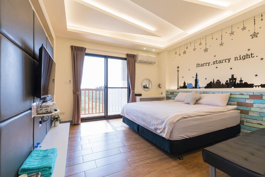 Postel nebo postele na pokoji v ubytování Fun Homestay