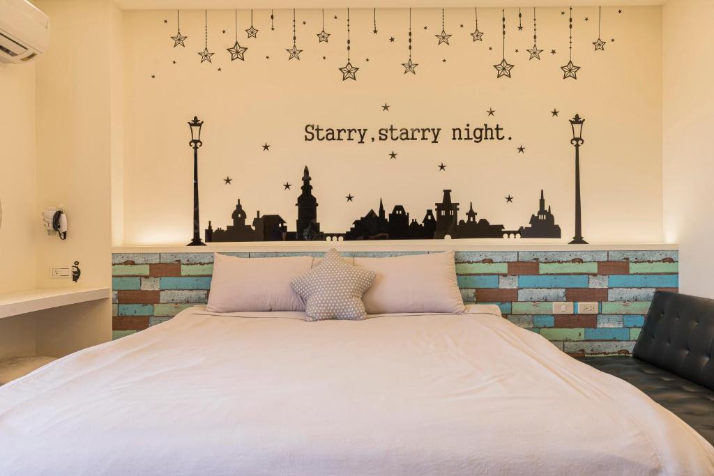 Postel nebo postele na pokoji v ubytování Fun Homestay
