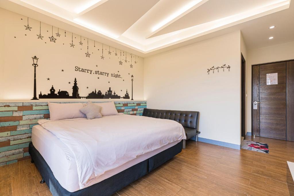 Postel nebo postele na pokoji v ubytování Fun Homestay