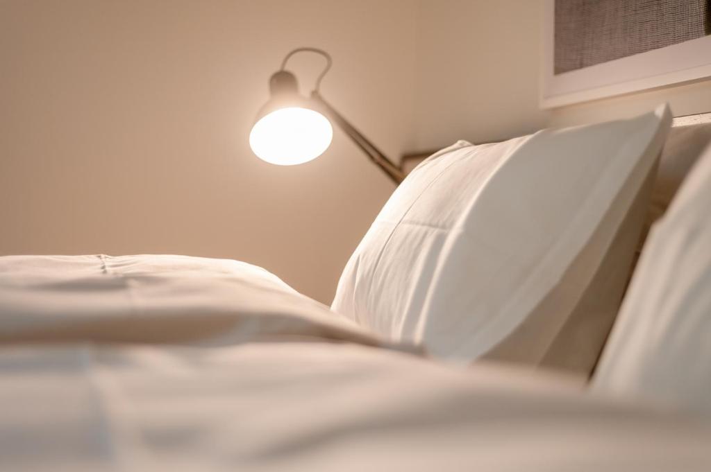 Voodi või voodid majutusasutuse Bigatt Hotel & Restaurant toas