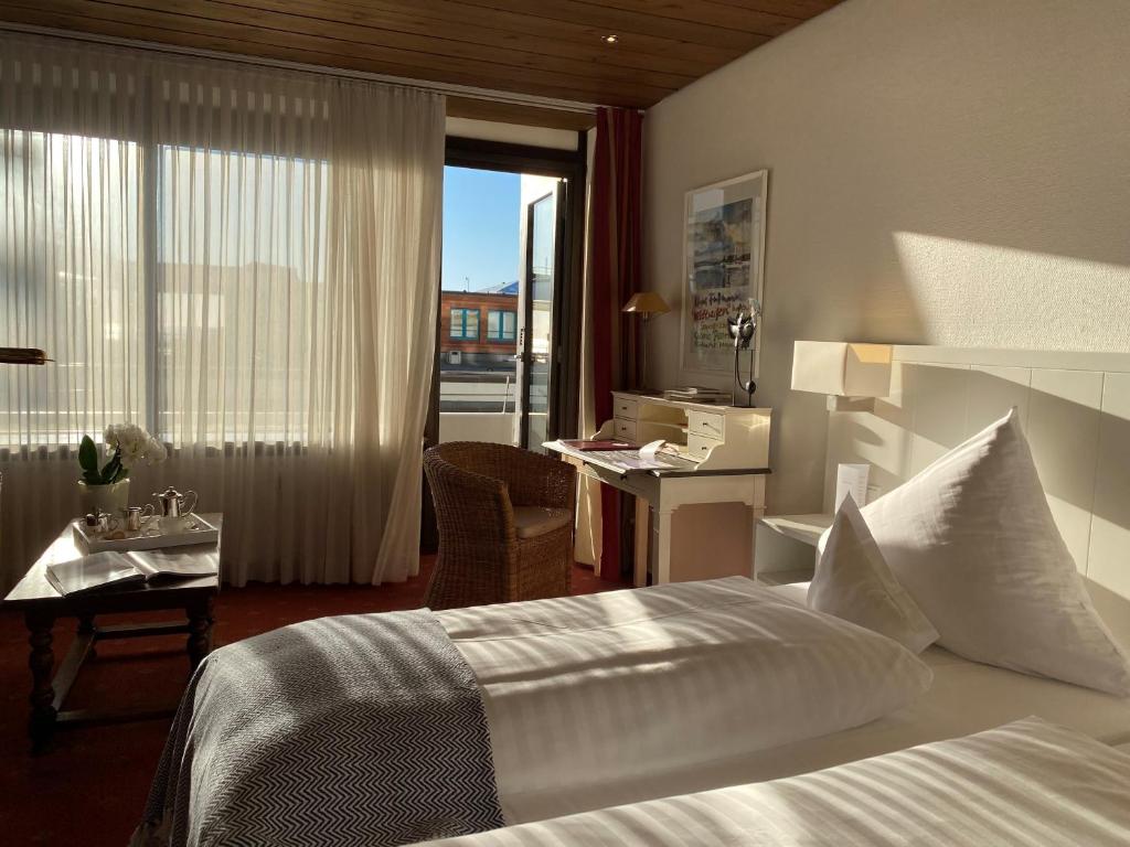 Postel nebo postele na pokoji v ubytování Hotel Wünschmann