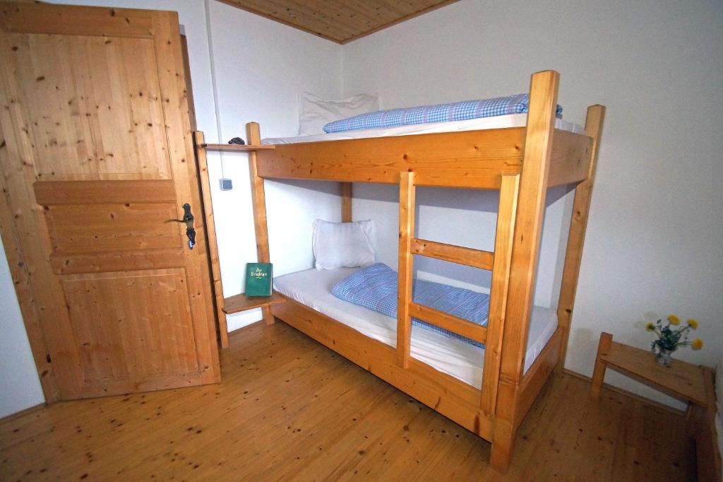 Postel nebo postele na pokoji v ubytování Straniger Alm