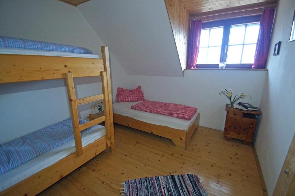 Postel nebo postele na pokoji v ubytování Straniger Alm