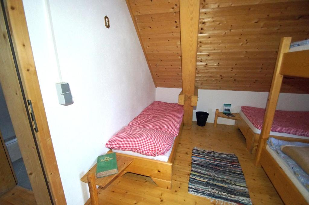 Postel nebo postele na pokoji v ubytování Straniger Alm