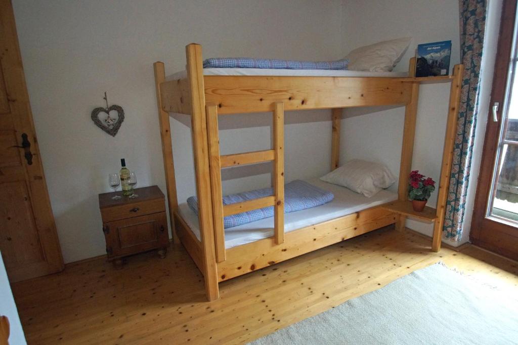 Postel nebo postele na pokoji v ubytování Straniger Alm