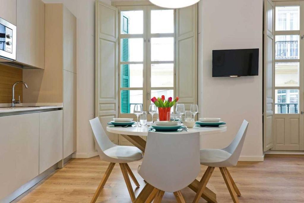 Televízia a/alebo spoločenská miestnosť v ubytovaní Apartamento Centro Histórico I