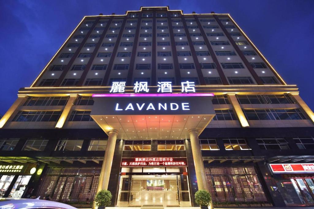 a tall building with a sign in front of it at Lavande Hotel Zhongshan Shaxi in Changzhou