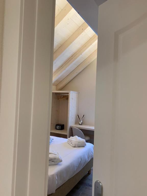 Postel nebo postele na pokoji v ubytování Hotel Rosengarten