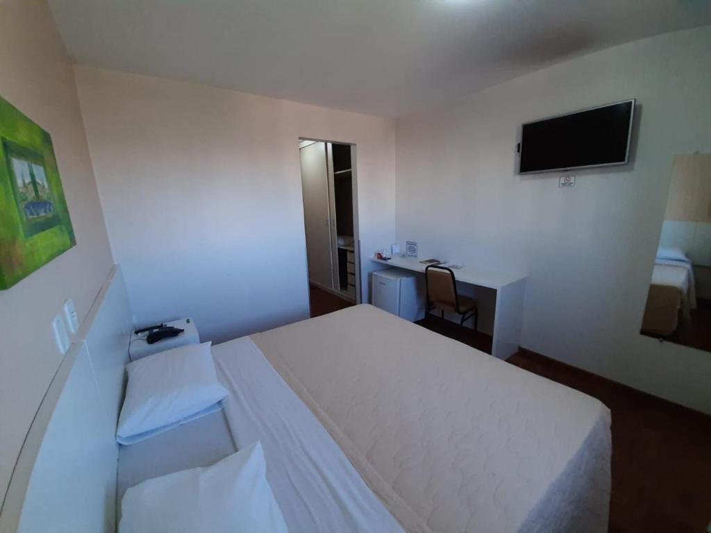 Postel nebo postele na pokoji v ubytování Hotel Londri Star