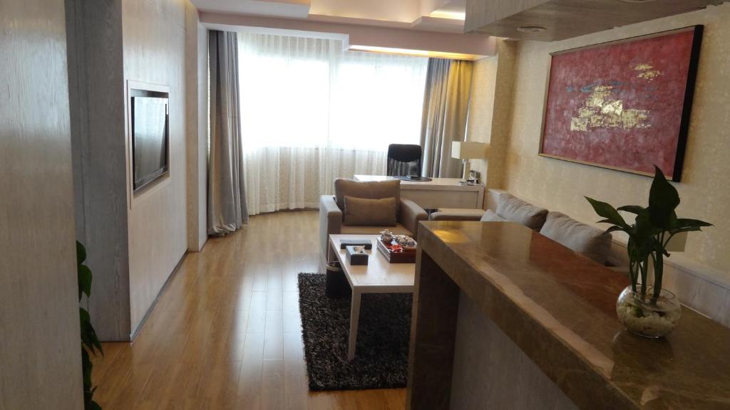 TV a/nebo společenská místnost v ubytování Holiday Inn Express Xiamen Lushan -Shopping Center by IHG