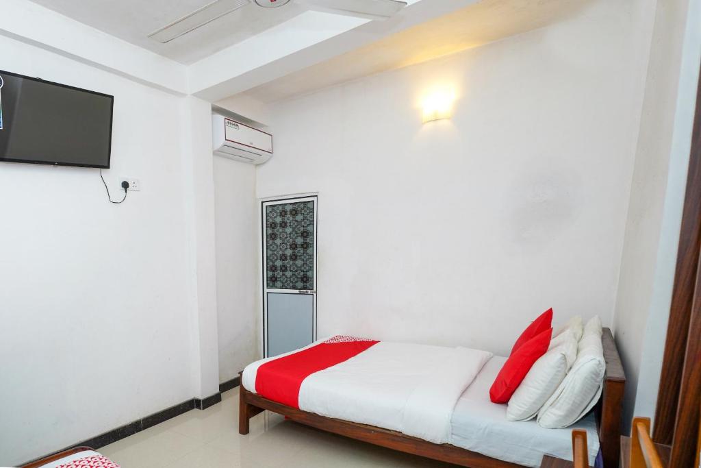 Postel nebo postele na pokoji v ubytování Kandyan Nethu Stay