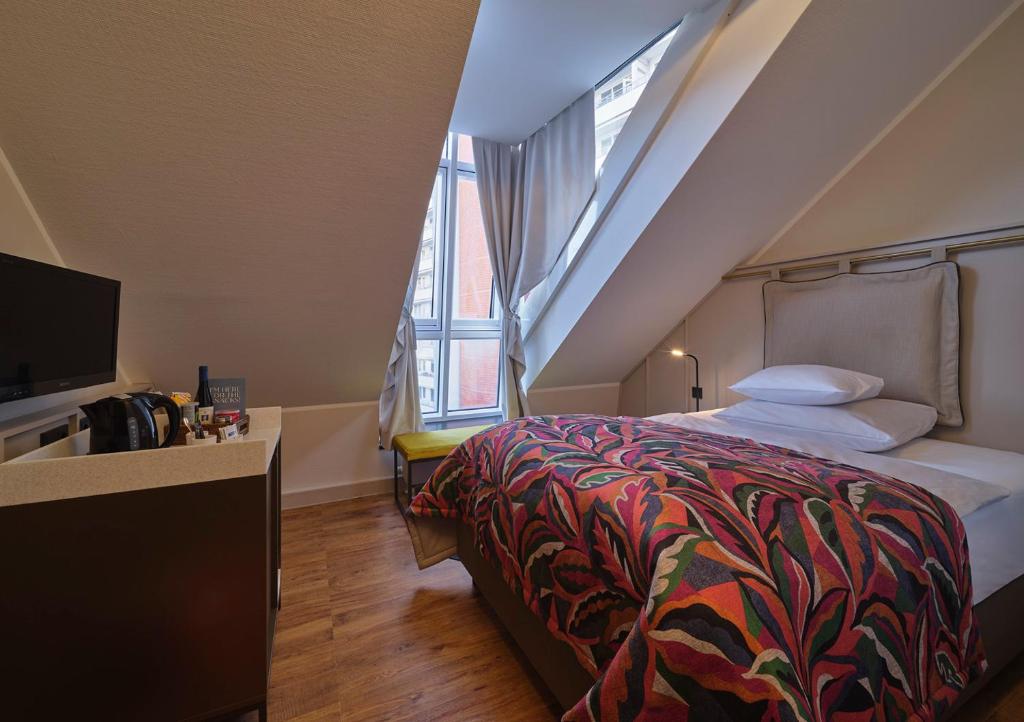 Postel nebo postele na pokoji v ubytování Classik Hotel Alexander Plaza
