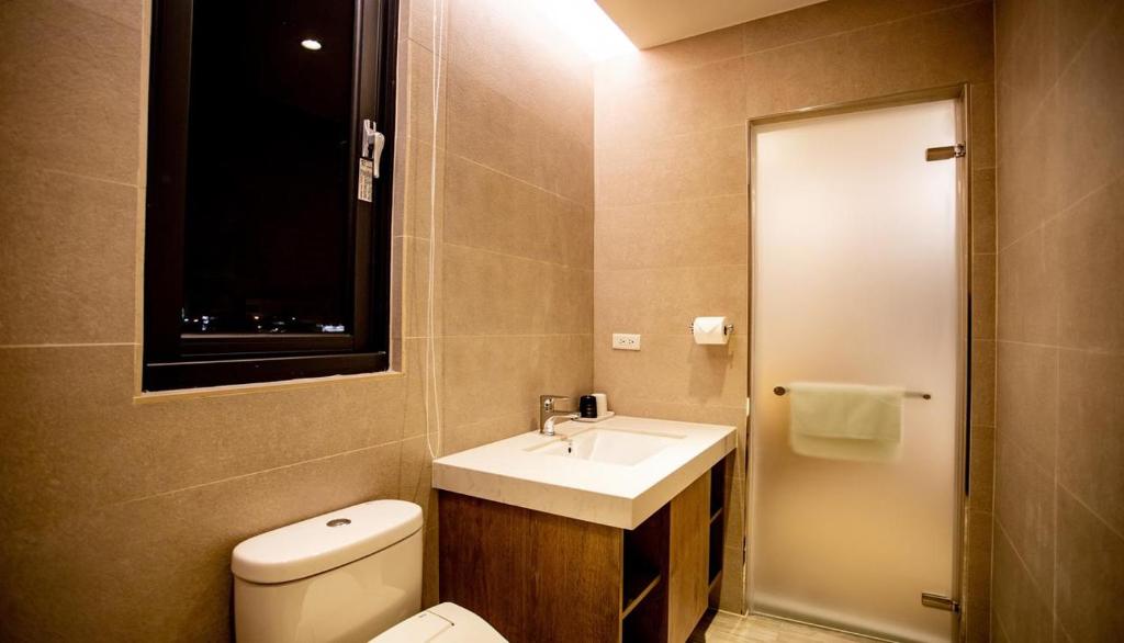 Koupelna v ubytování Beauty Avenue Inn