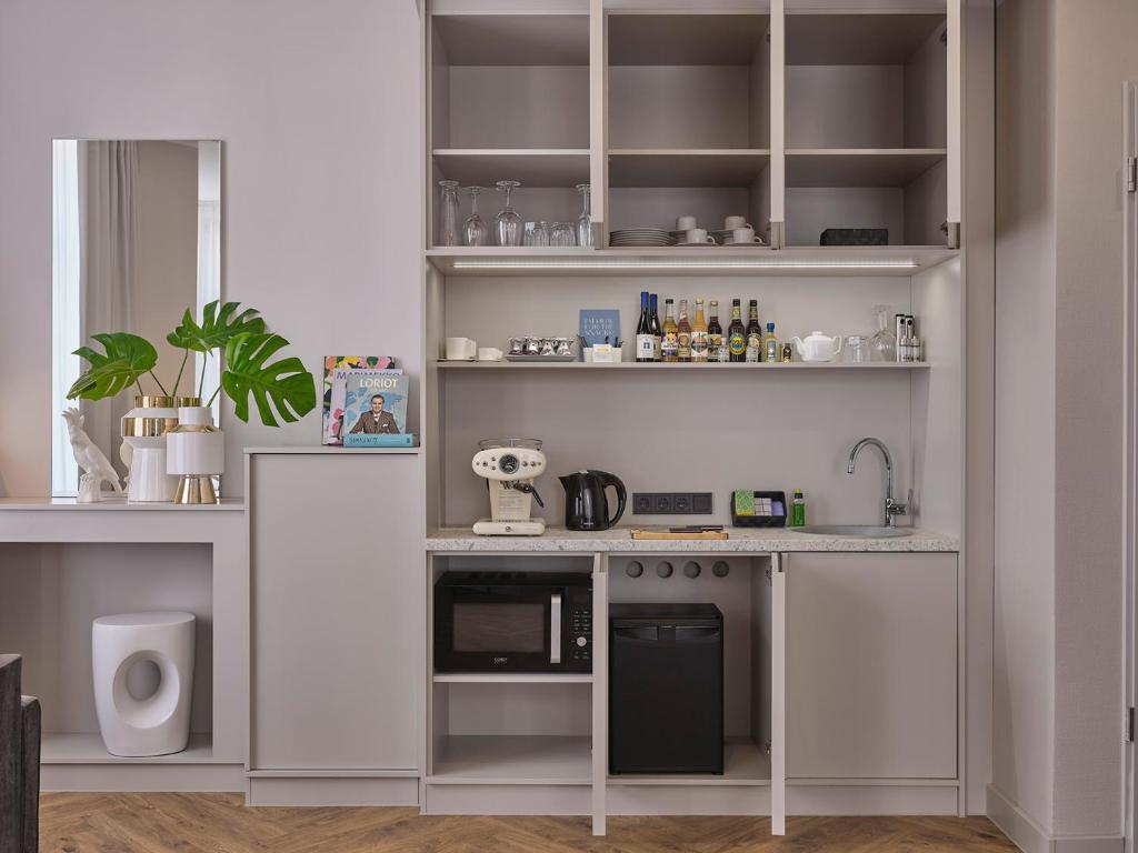 Kuchyň nebo kuchyňský kout v ubytování Classik Hotel Alexander Plaza