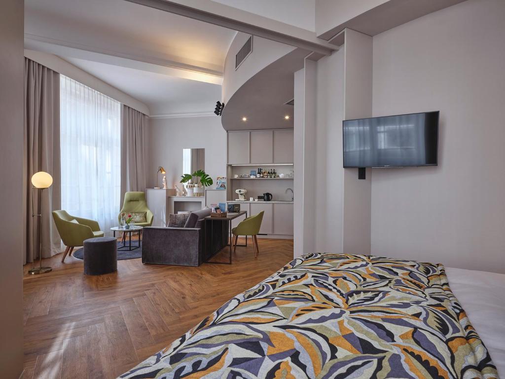 TV a/nebo společenská místnost v ubytování Classik Hotel Alexander Plaza