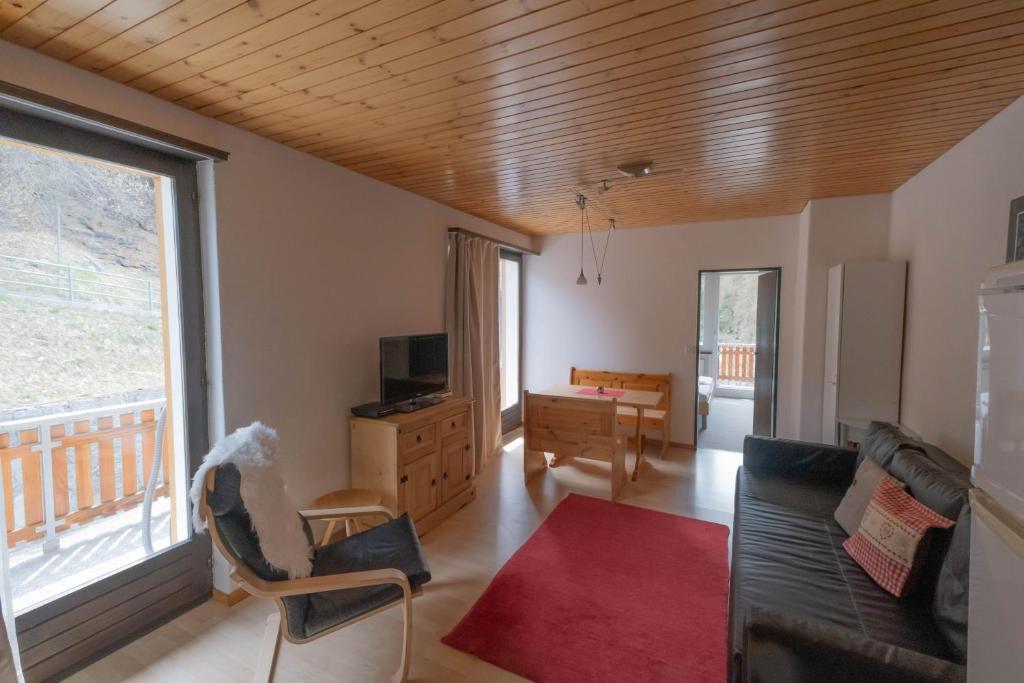 TV a/nebo společenská místnost v ubytování Panorama at Haus Waldheim! Nr 12