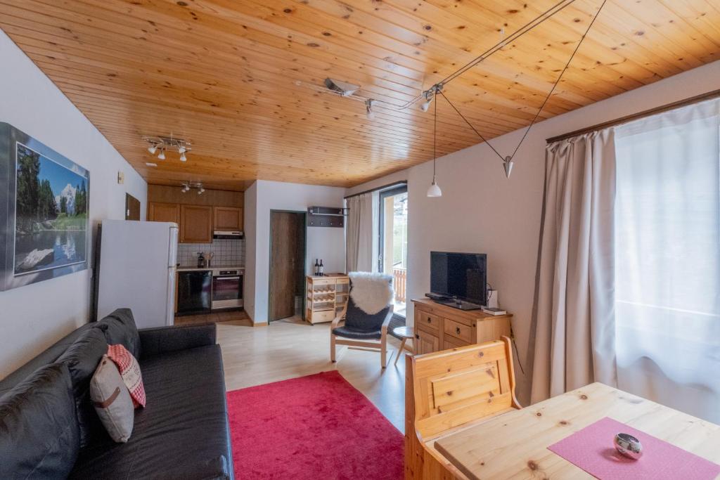 TV a/nebo společenská místnost v ubytování Panorama at Haus Waldheim! Nr 12