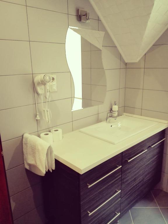 Koupelna v ubytování Főnix Apartmanház