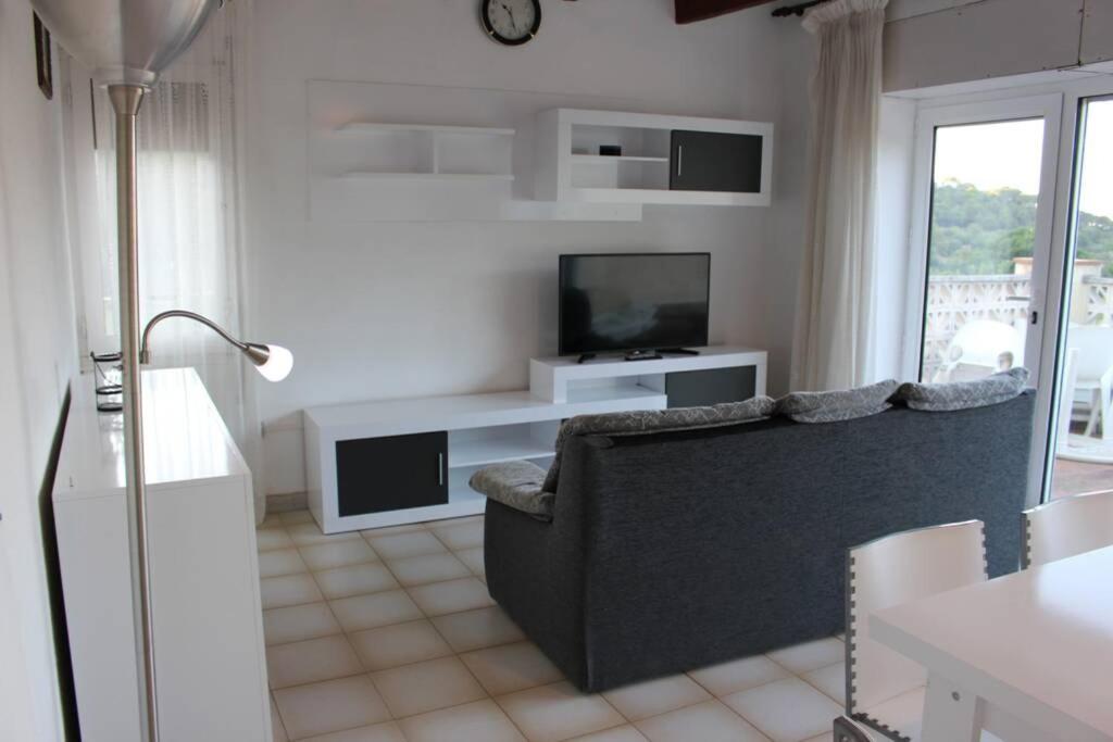 TV a/nebo společenská místnost v ubytování Brisa, apartamento de tres habitaciones B