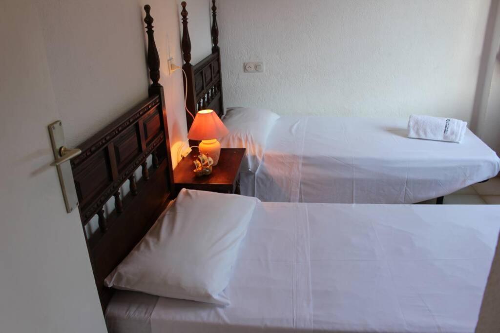Postel nebo postele na pokoji v ubytování Brisa, apartamento de tres habitaciones B