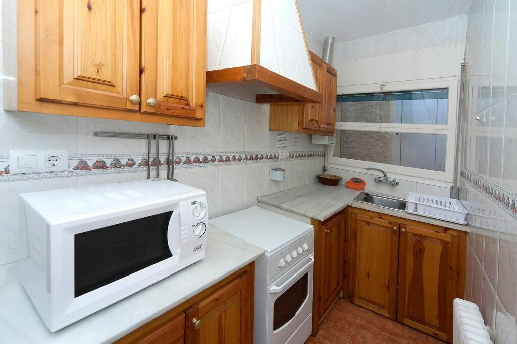 Kuchyň nebo kuchyňský kout v ubytování Brisa, apartamento de tres habitaciones B