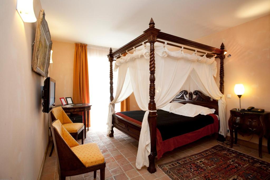 Krevet ili kreveti u jedinici u okviru objekta Hostellerie Les Hauts De Sainte Maure